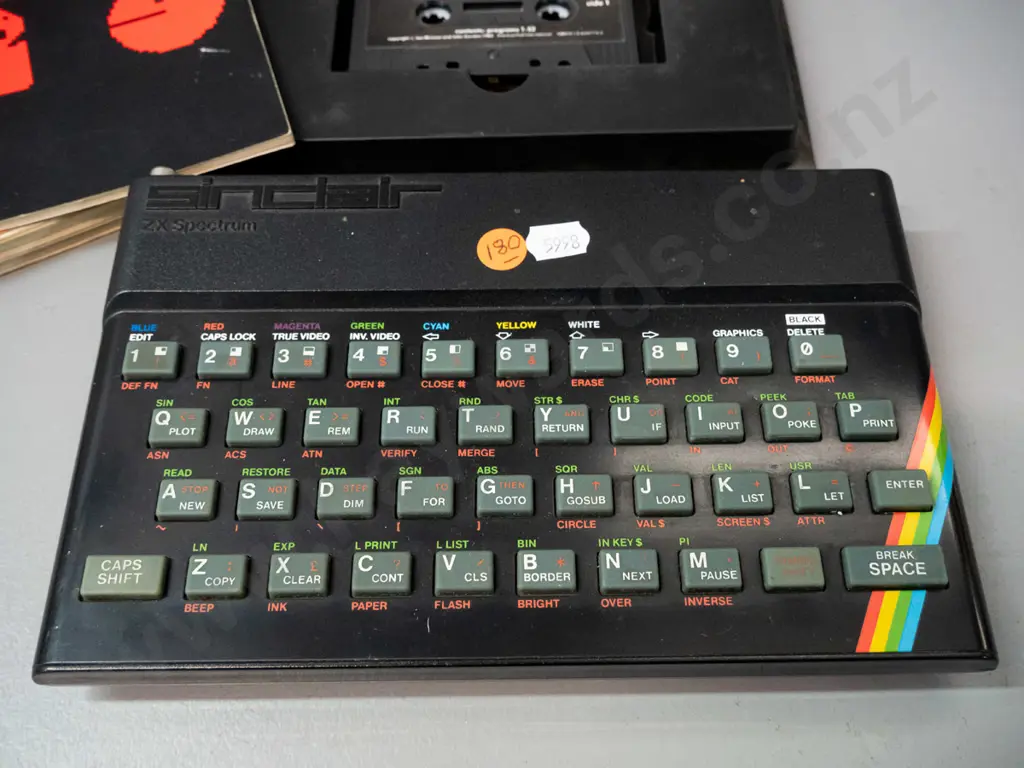 Sinclair ZX Spectrum compact home computer with data cassette and manual - no power supply or peripherals - untested Image 1++