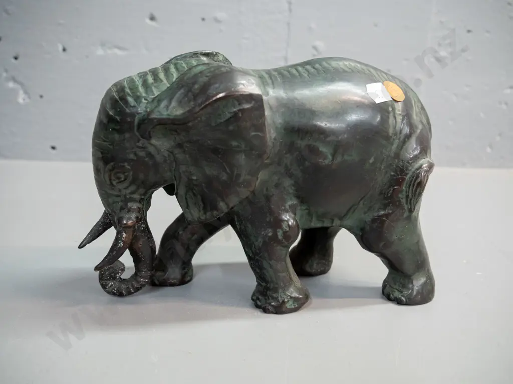 4 cast metal elephant figures with aged finish - largest is H-130 L-200 Image 1++