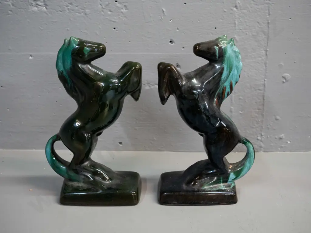 pair of Blue Mountain teal pottery rearing horses H-230 W-130 Image 1++