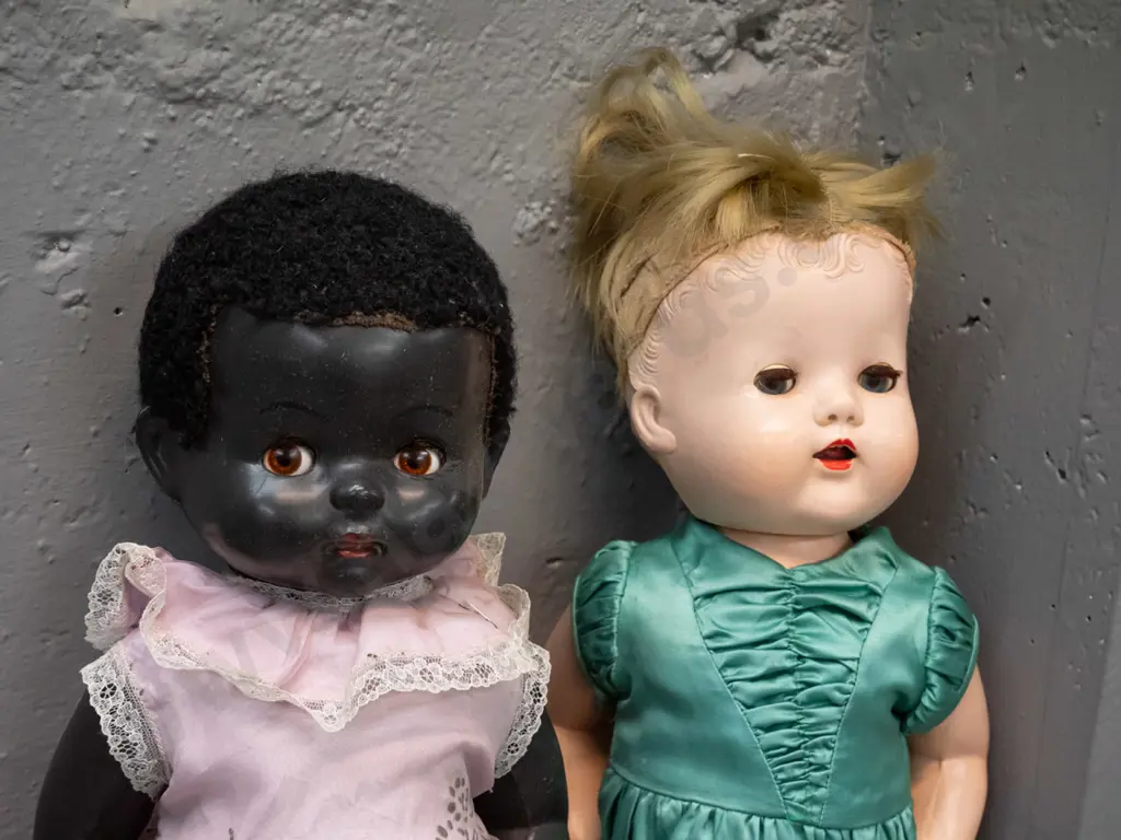 two vintage plastic-bodied dolls with dresses - one has most hair worn off, both with vintage clothing that needs Image 1++