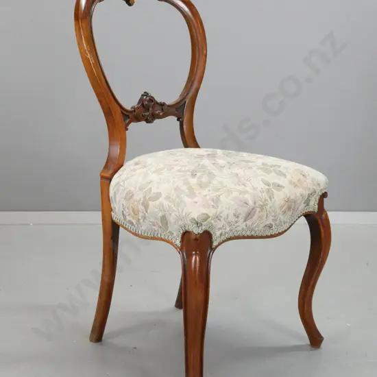 Victorian walnut cab-leg balloon back chair with carved back splat and crest, some fading to floral upholstered seat, a