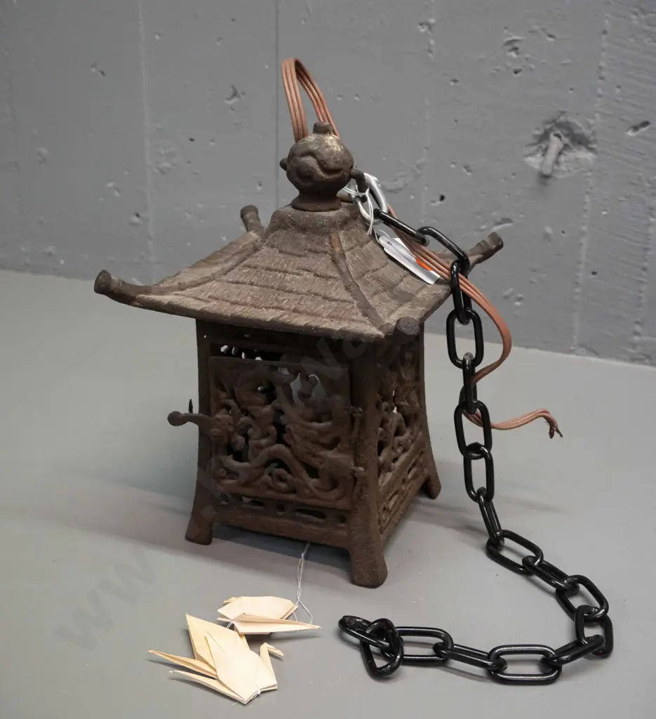 cast iron pagoda shape lamp or candle holder with hanging chain, converted to electric with light bulb fitting, cord has Image 1++
