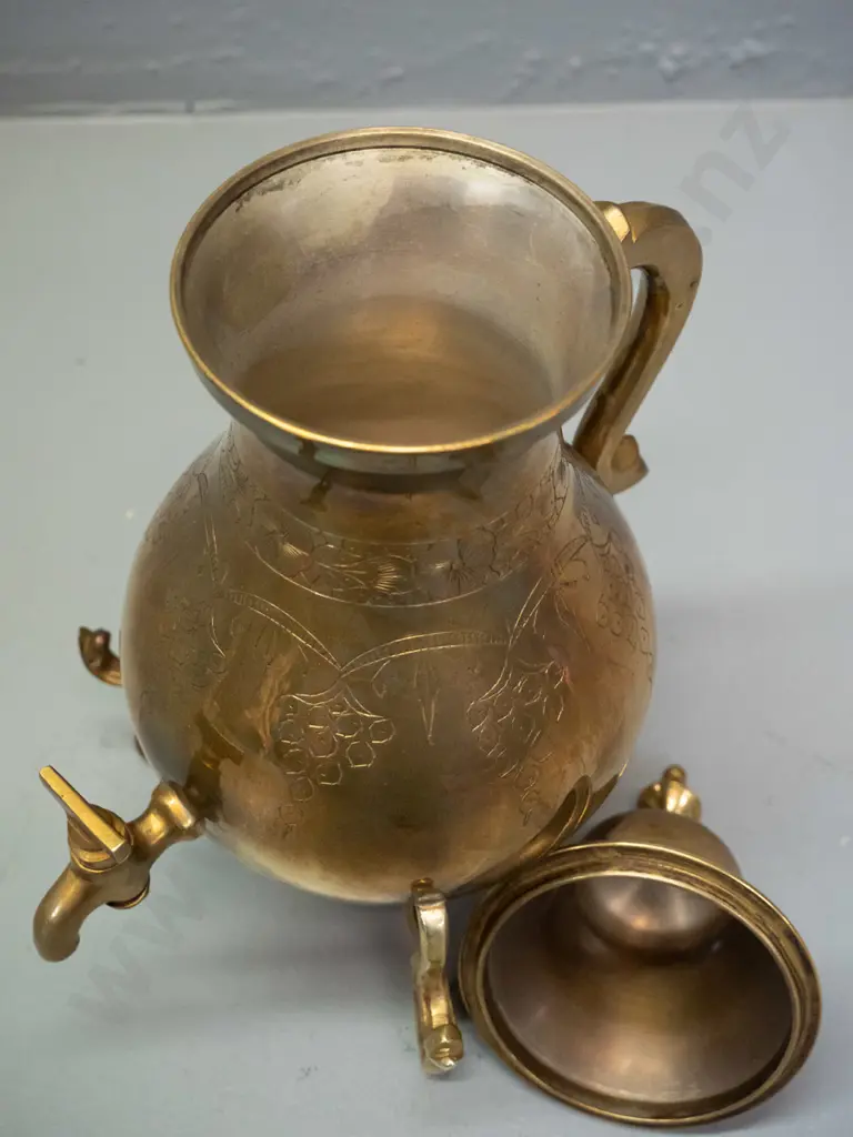 brass finish samovar-shaped lidded pot with spigot with etched decoration, 3 scroll feet - some corrosion to lid. H-300 Image 1++