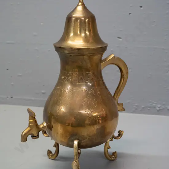 brass finish samovar-shaped lidded pot with spigot with etched decoration, 3 scroll feet - some corrosion to lid. H-300
