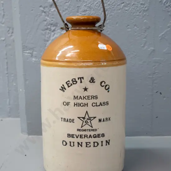 narrow mouth stoneware crock with wire handle - marked West & Co. Dunedin H-330 D-170