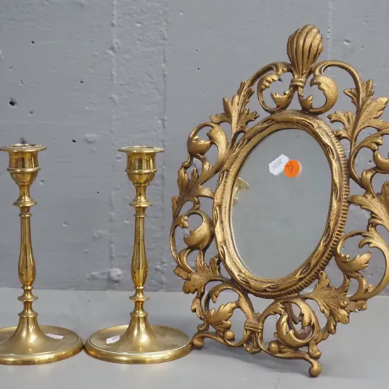 pair of cast brass candlesticks and a cast metal gilt-finish dressing table mirror H-280 W-210