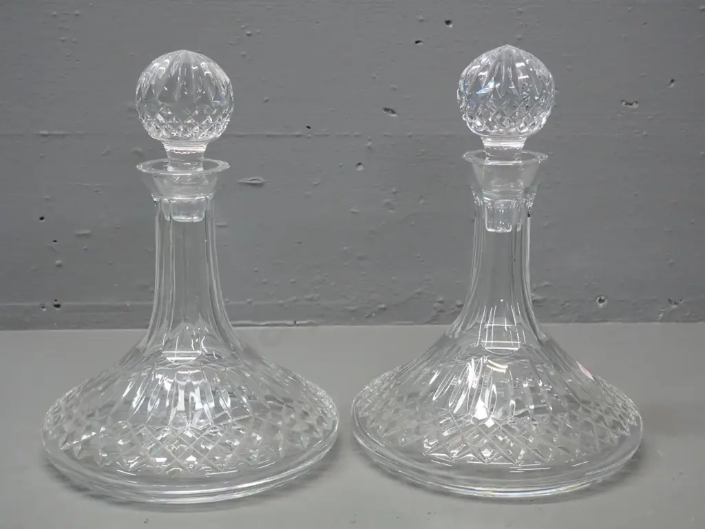 pair of cut crystal stoppered wide-base ship's decanters, one with Waterford mark H-260 D-180 - one stopper has small Image 1++