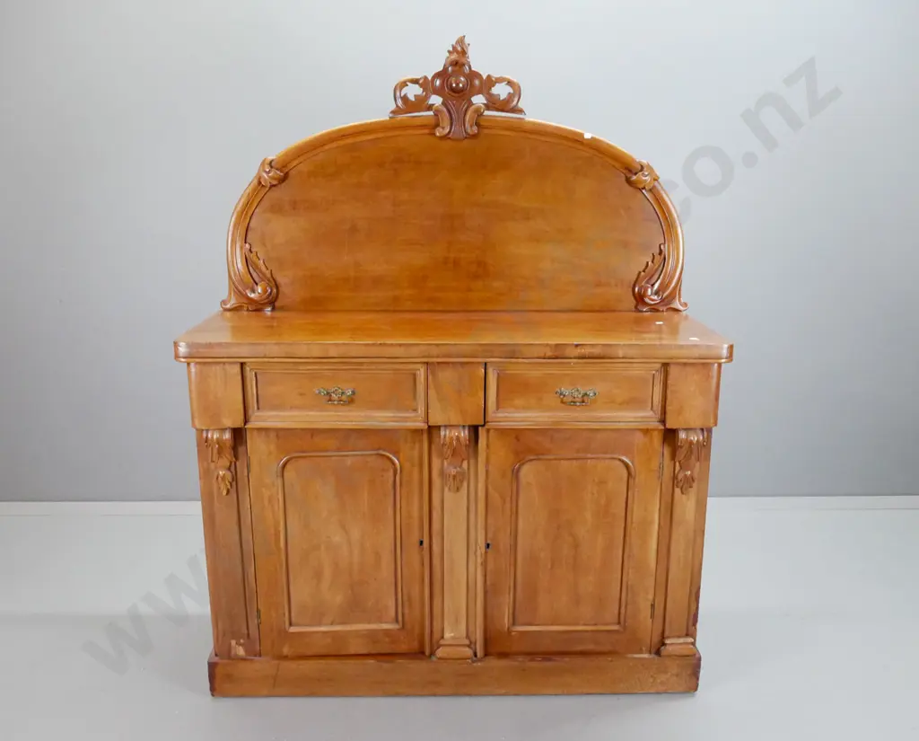 Victorian walnut carved-back chiffonier with carved crest on shaped back, 2 drawers with pierced brass handles, 2 Image 1++