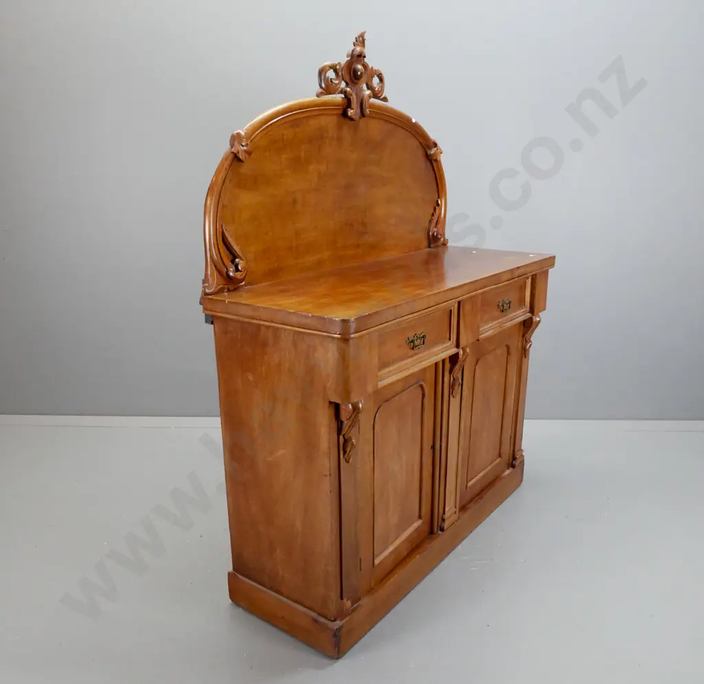 Victorian walnut carved-back chiffonier with carved crest on shaped back, 2 drawers with pierced brass handles, 2 Image 1++