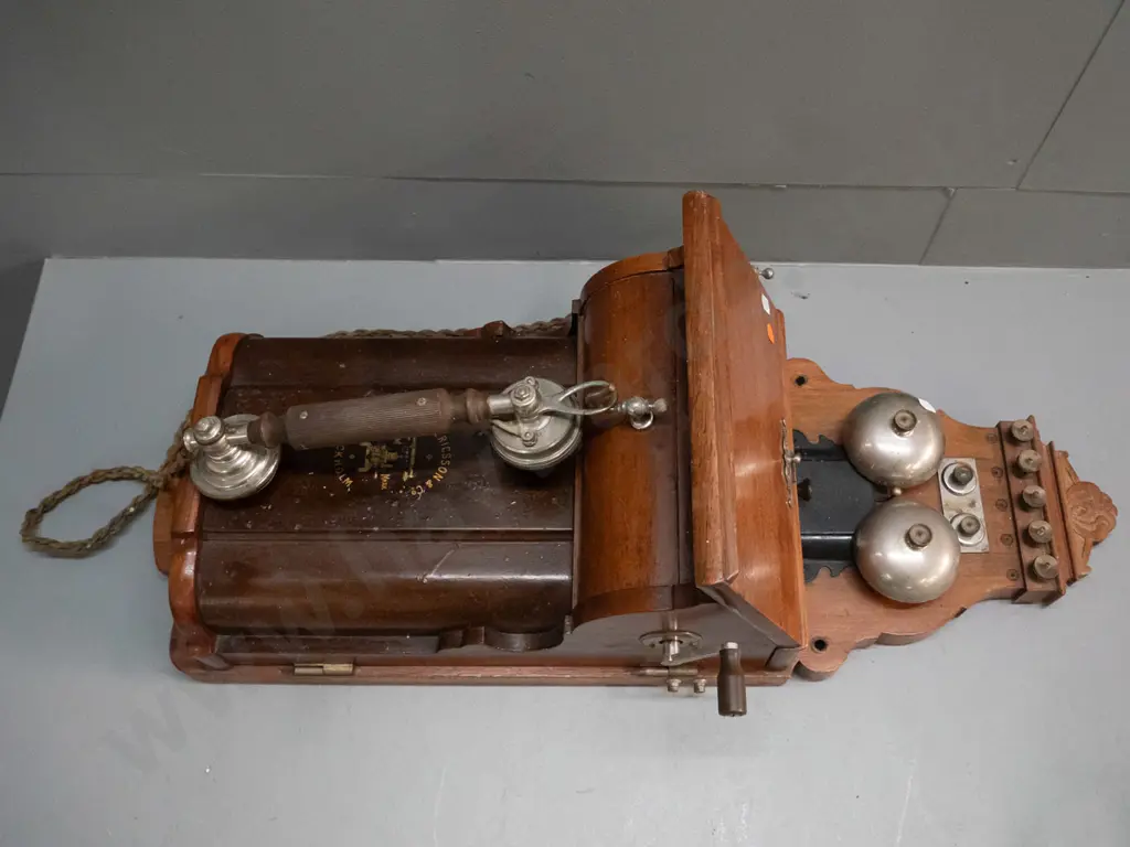 vintage Ericsson & Co Stockholm wall mounted hand crank telephone with walnut & metal case. Some corrosion to chrome Image 1++