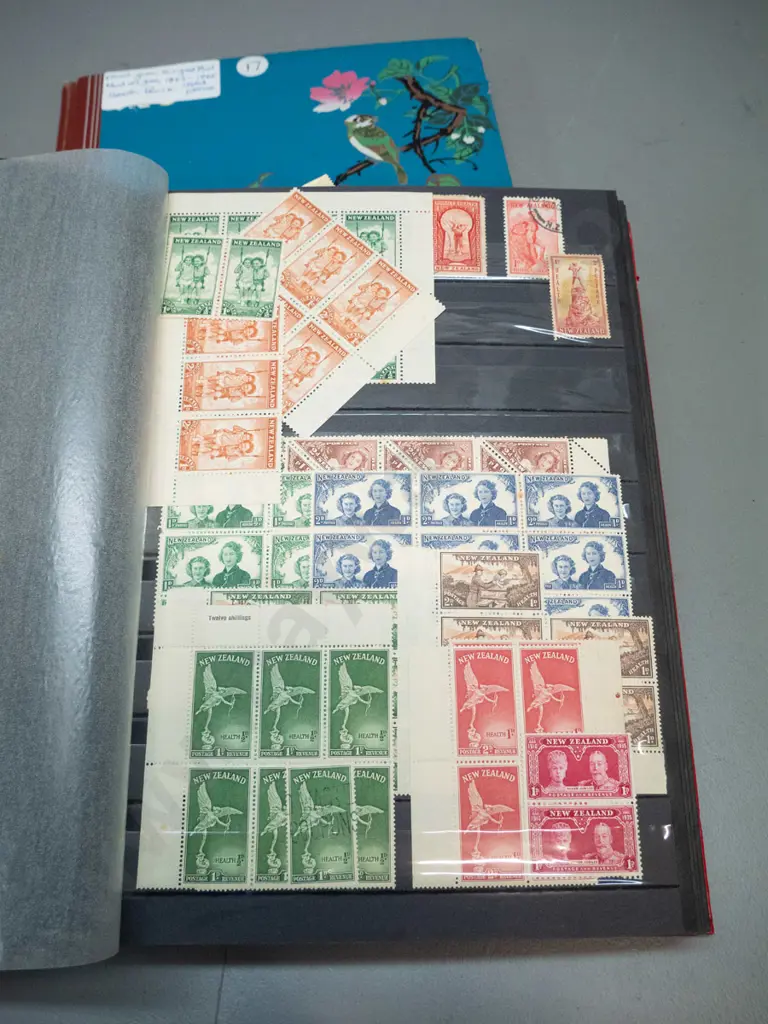 4 stamp albums containing NZ stamps, earliest is 1884 Victoria, includes some mint Health stamps etc. Image 1++