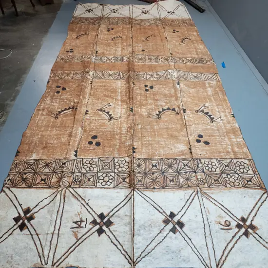 very large tapa cloth with digits 14 and 16 on each end. L-3960 W-1940