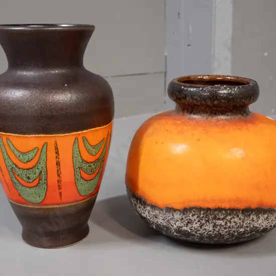 2 German pottery orange and brown vases - taller one H-215 has fleck to rim