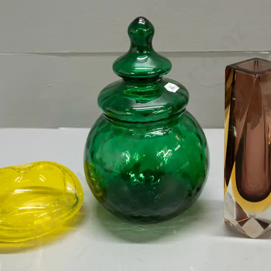 3 glass items - art glass faceted vase, moulded textured green lidded pot H-200 and a yellow ashtray