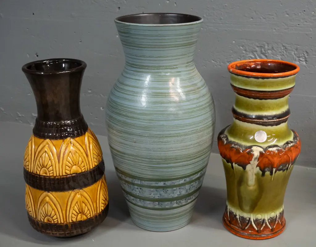 3 vases - 2 German pottery moulded relief pattern and a large one w/some sticker residue, hard to read mark H-380 D-190 Image 1++