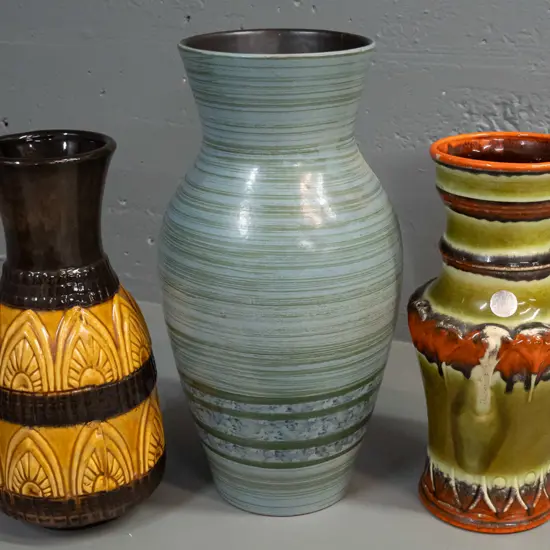 3 vases - 2 German pottery moulded relief pattern and a large one w/some sticker residue, hard to read mark H-380 D-190