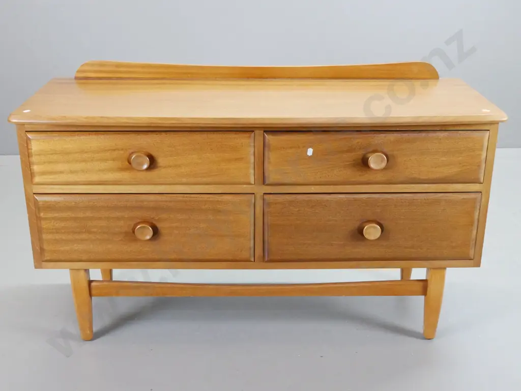 mid-century mahogany low 4-drawer chest with inset wooden knobs, stretcher base, minor marks to top. H-685 W-1170 D-430 Image 1++