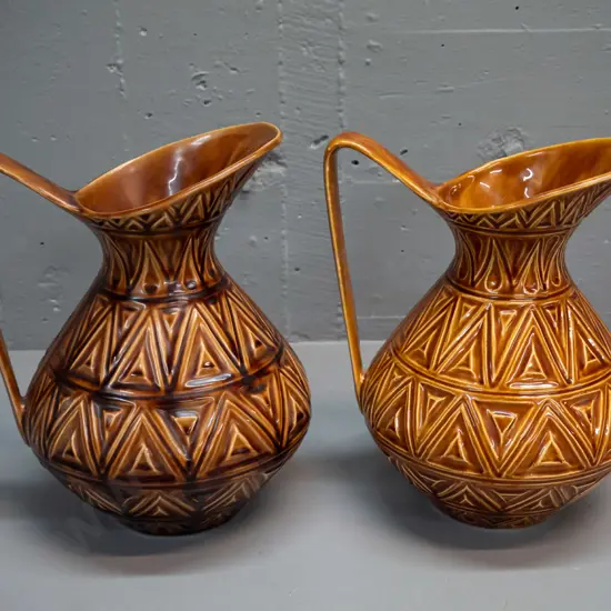 2 large "Celtic" Irish pottery jugs with incised geometric diamond patterns, slightly different brown tones, slightly