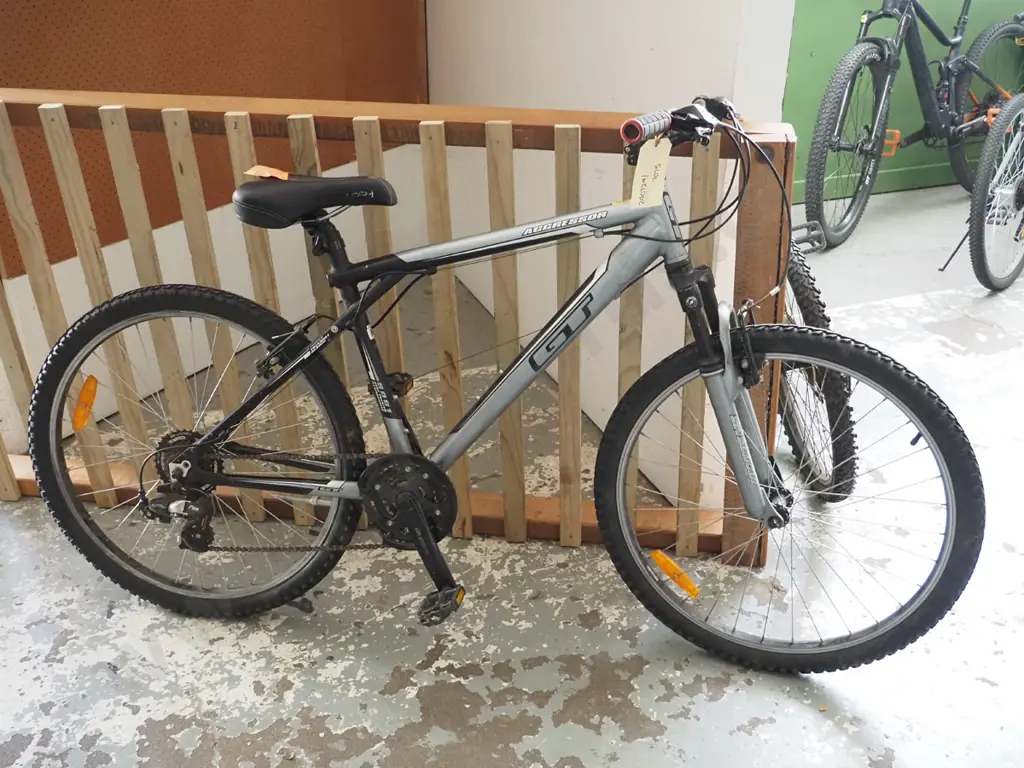 Grey, black and white Agressor GT branded bicycle Image 1++