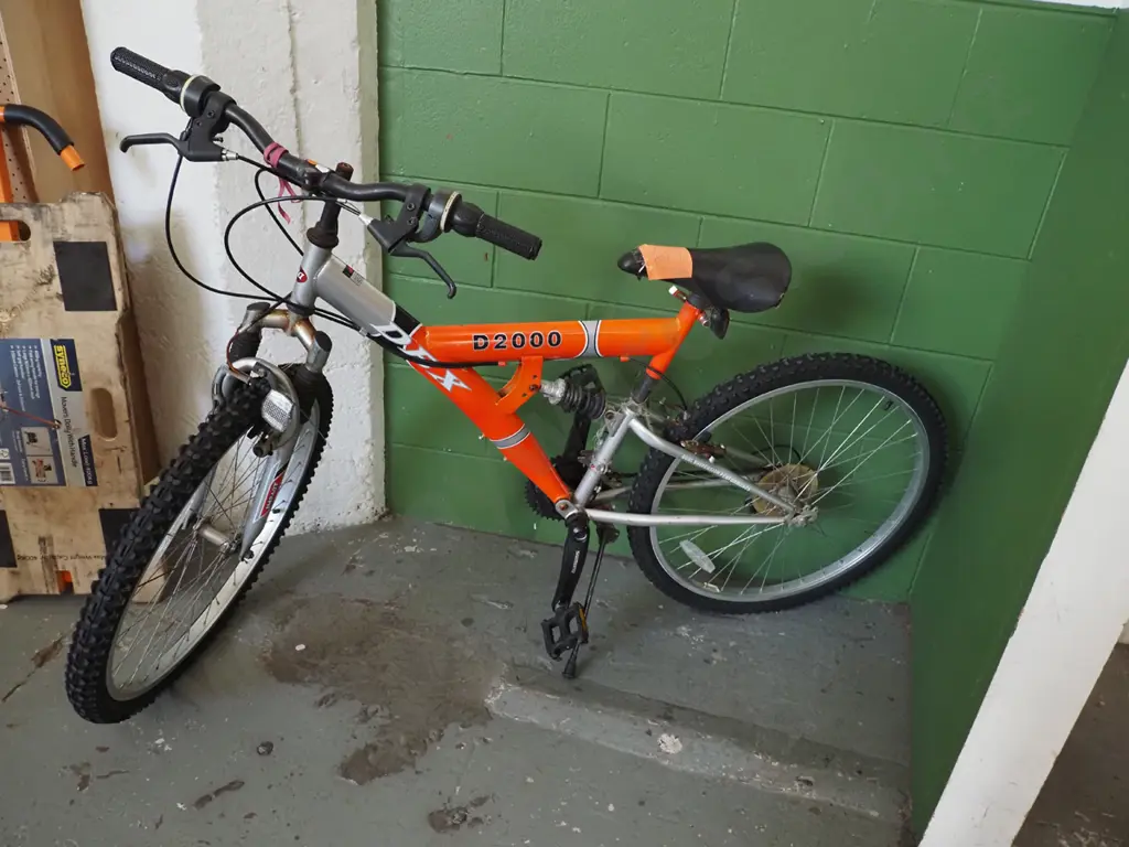 Black and Orange DBX mountain bike Image 1++