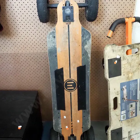 evolve GRT Black and wooden electric skateboard