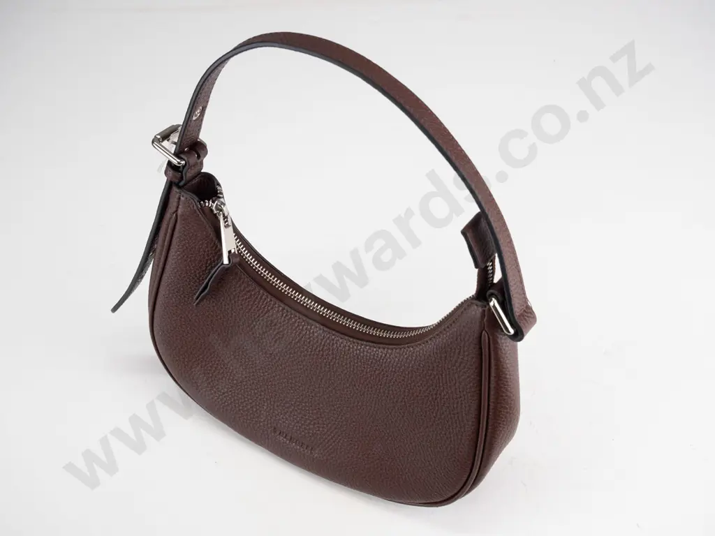 Brown shoulder bag containing bank card, keys  Image 1++