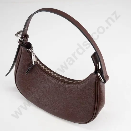 Brown shoulder bag containing bank card, keys 