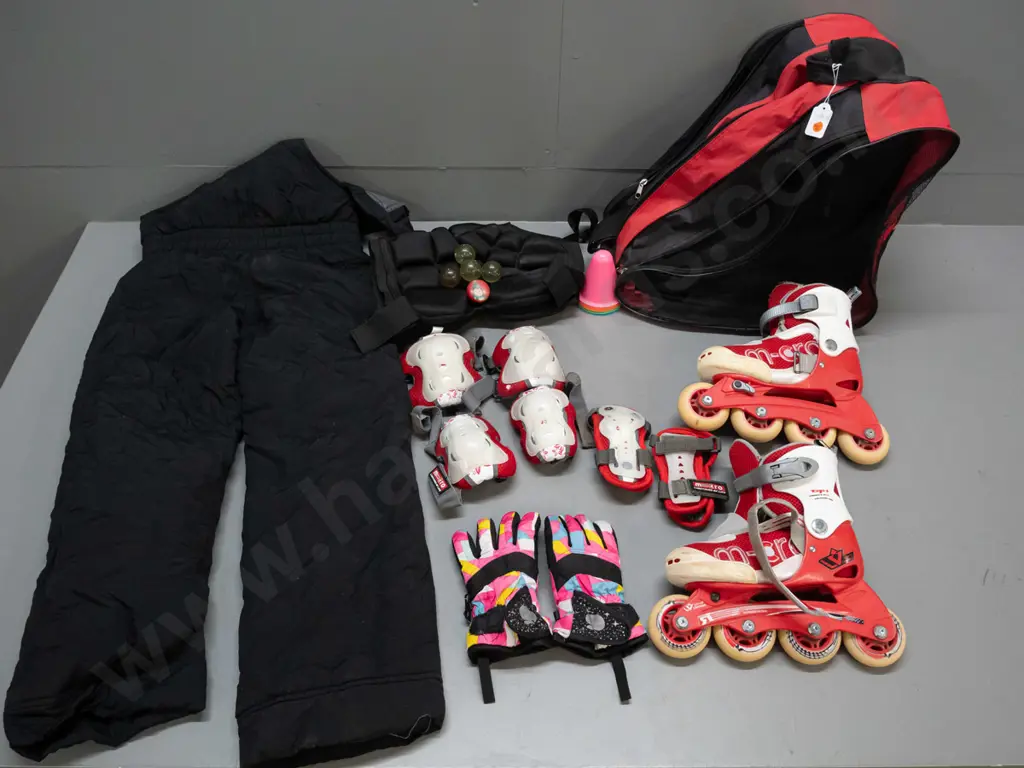 Red M-oro roller skate bag. Contains Roller skates , jacket, DVD and protective gear. Image 1++