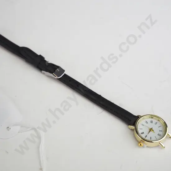 Small gold watch with thin brown strap (broken)