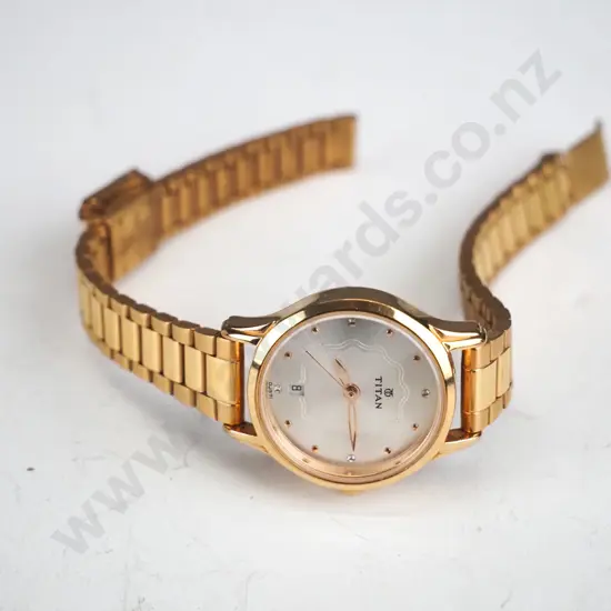 Titan gold woman's watch