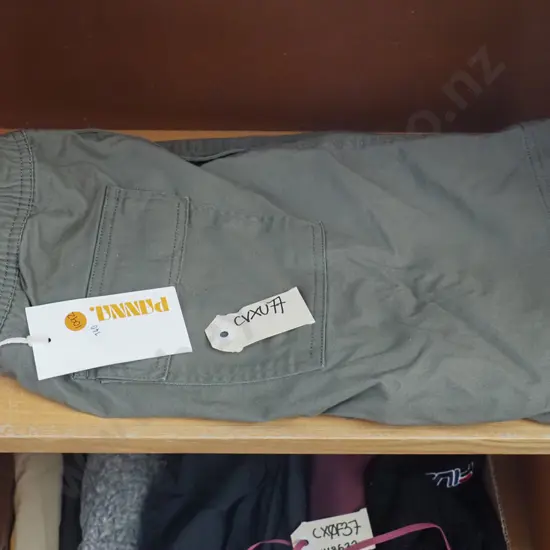 Panna shorts coloured green with a tag attached