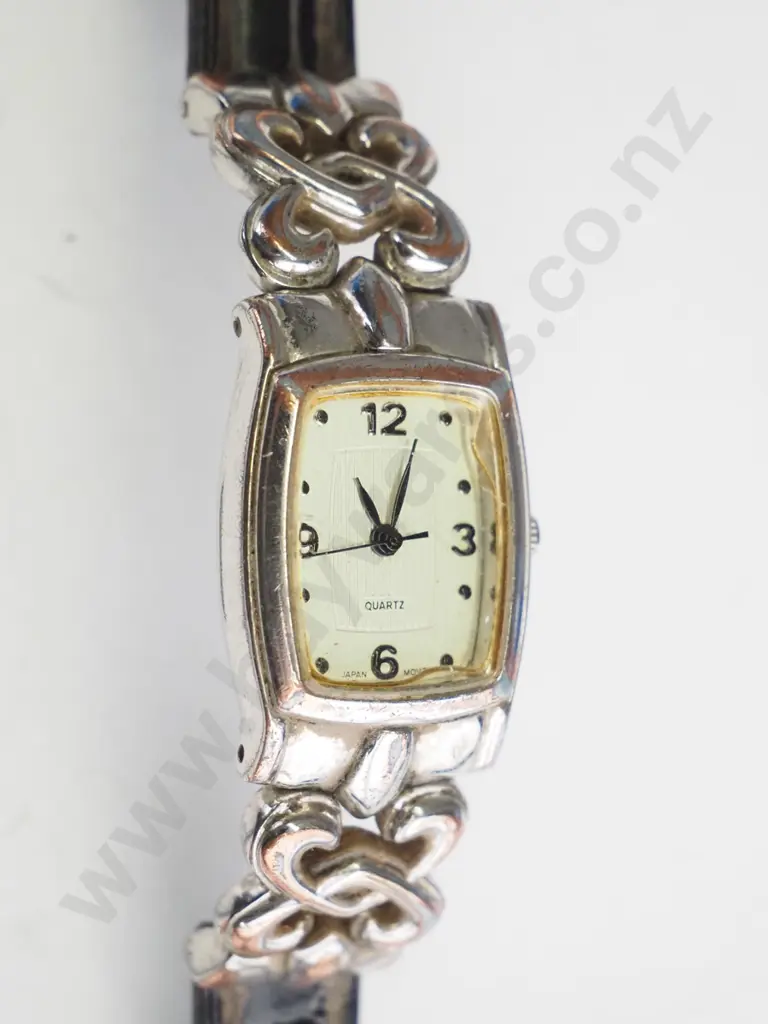 Square faced ladies watch - celtic silver detail in brown strap - worn Image 1++
