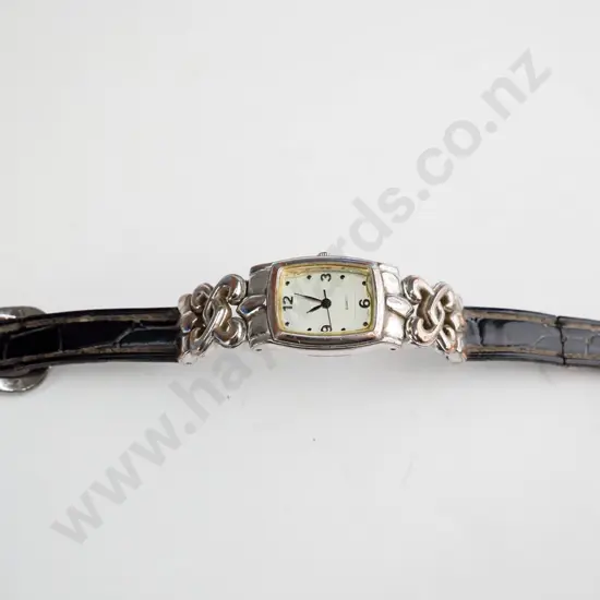 Square faced ladies watch - celtic silver detail in brown strap - worn