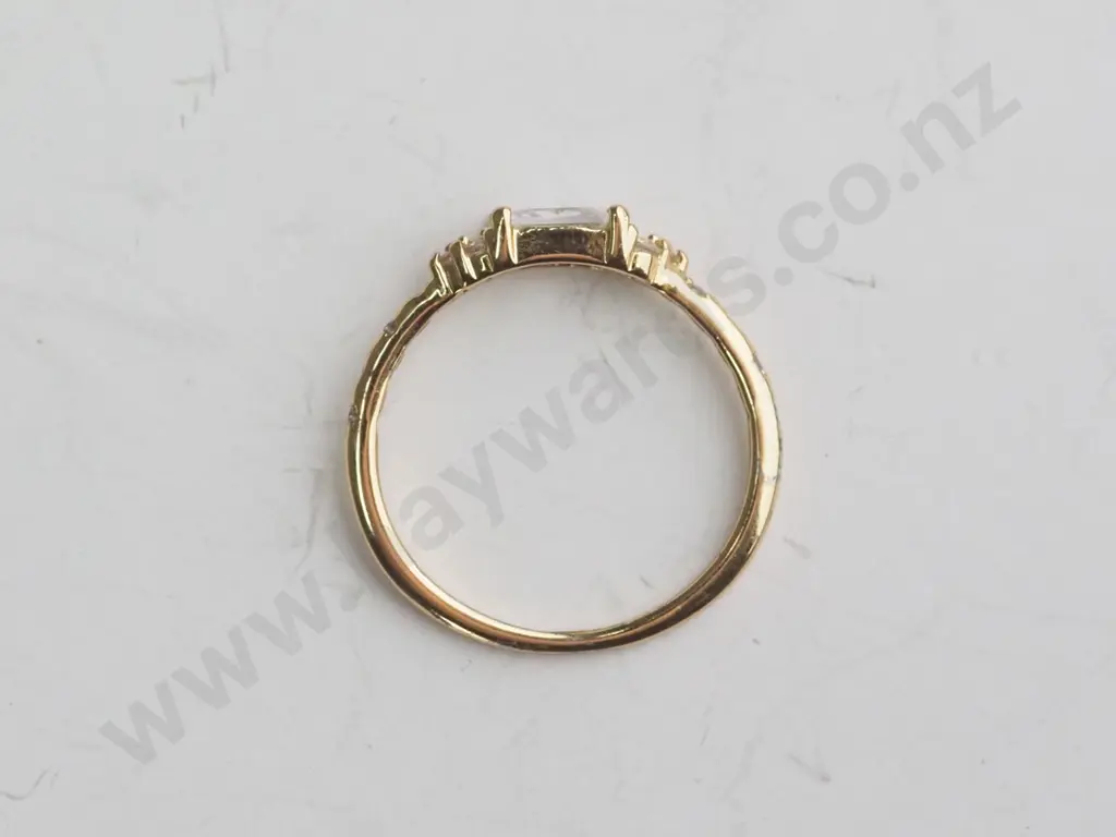 Gold Coloured ring with white/silver gems Image 1++