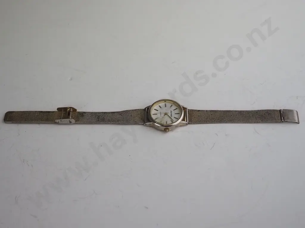 Silvery/Gold Quartz watch - white round face Image 1++