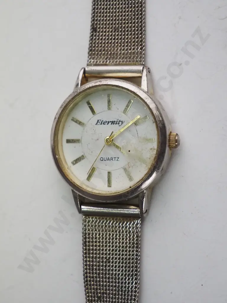 Silvery/Gold Quartz watch - white round face Image 1++