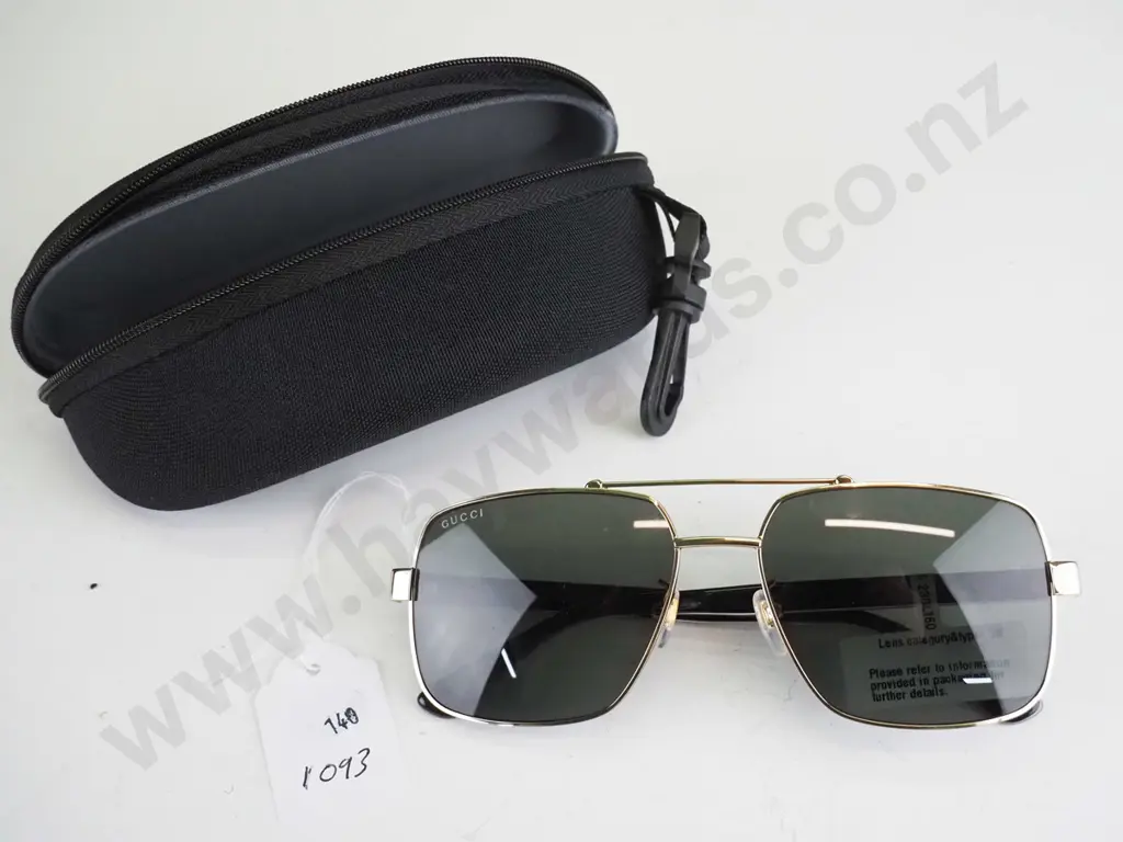 Gucci gold framed glasses with tag attached Image 1++