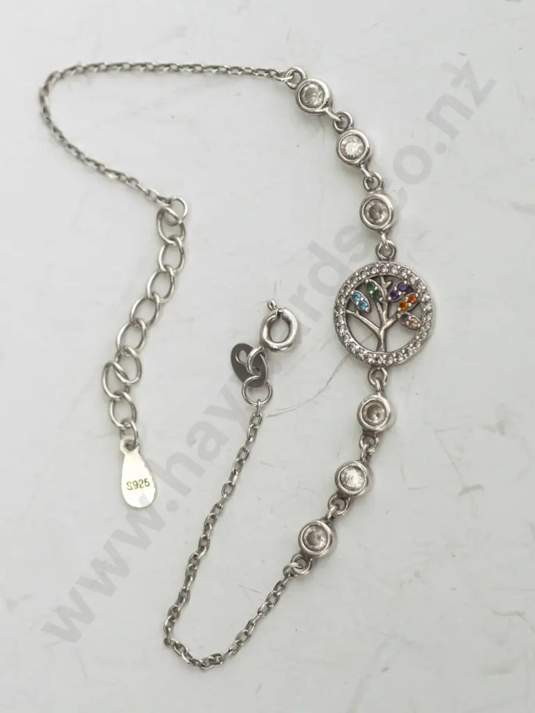 Silver Chain Bracelet with six silver coloured gems and a tree with colorful leaves. Image 1++