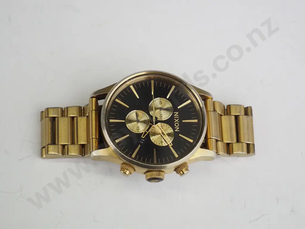 gold Nixon watch  Image 1++