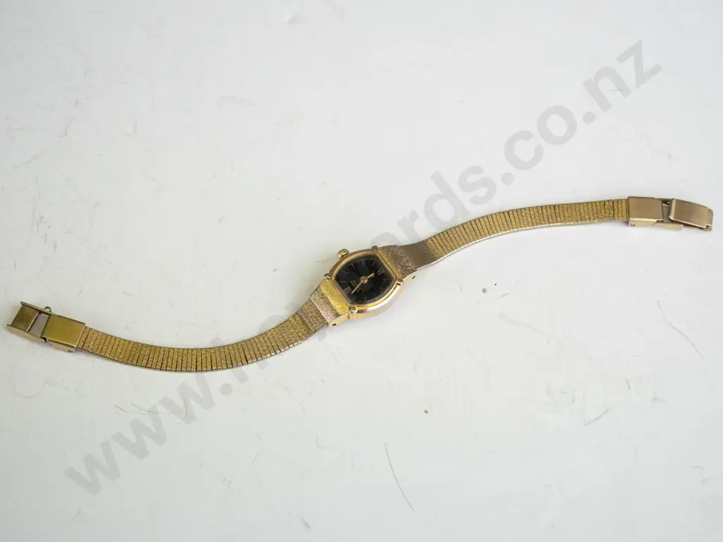 Small gold ""Citizen"" branded watch.  Image 1++