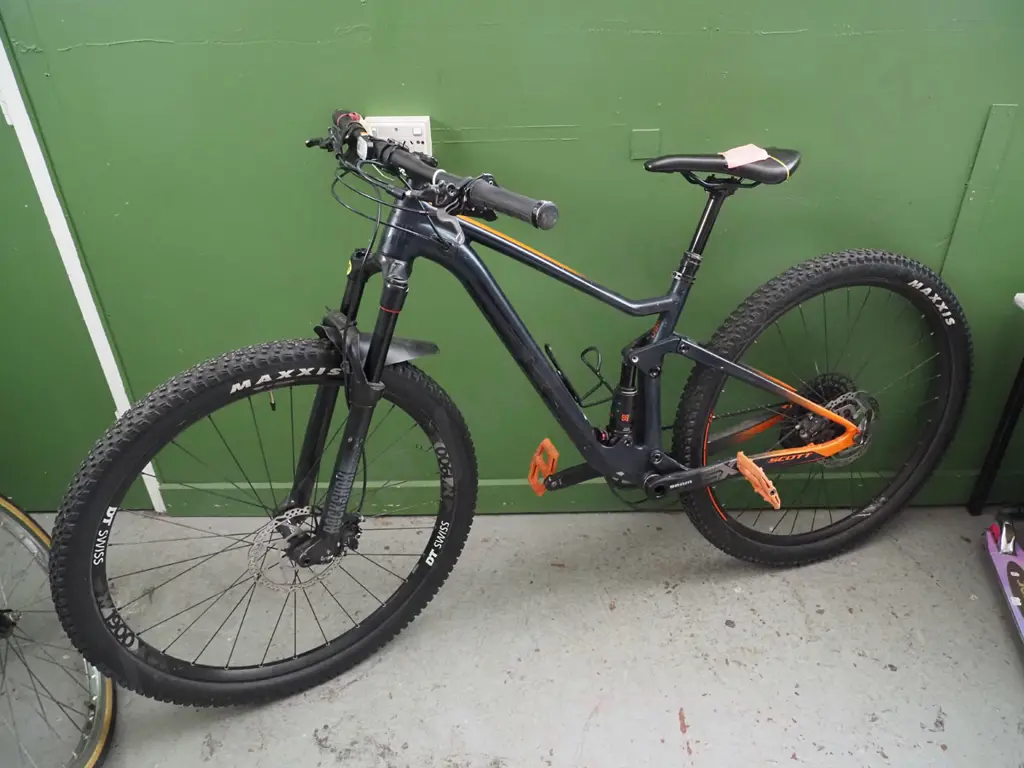 Black and Orange Spark Mountain bike Image 1++