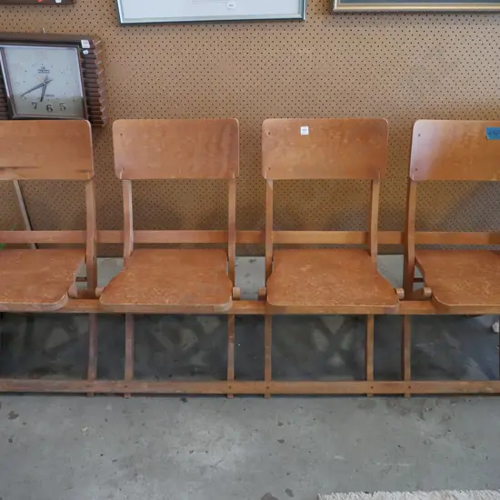 bank of 4 plywood bench seats