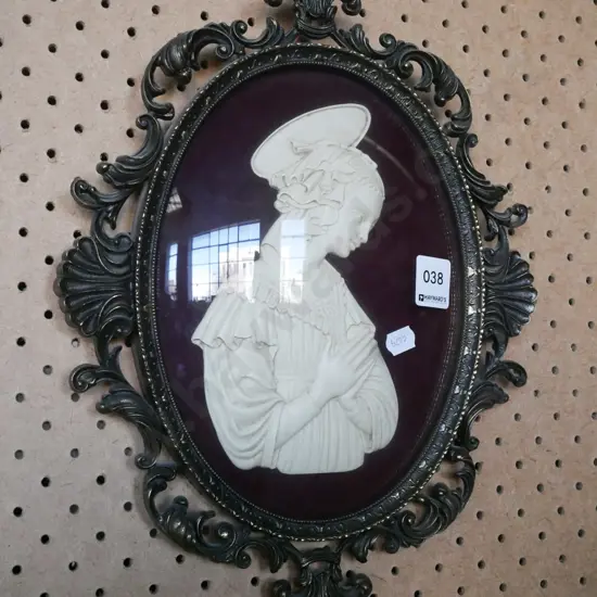 framed silhouette in convex glass