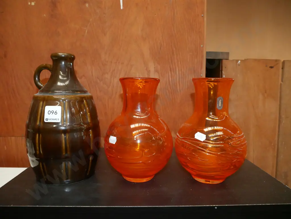 2 orange glass vases and a glazed bottle, no stopper Image 1++