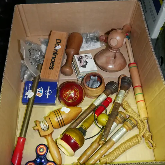 box; dominoes, spinning tops, knuckle bones etc