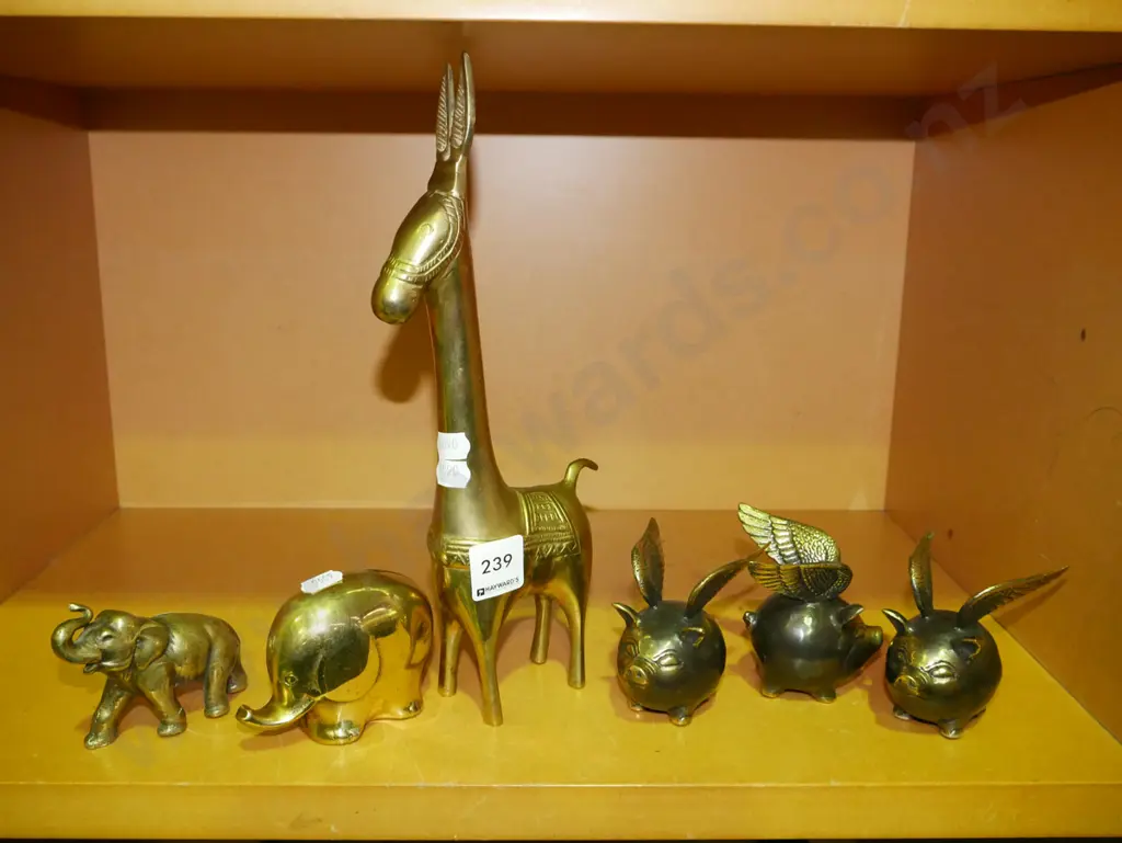 shelf of brass figurines Tallest H-280 Image 1++