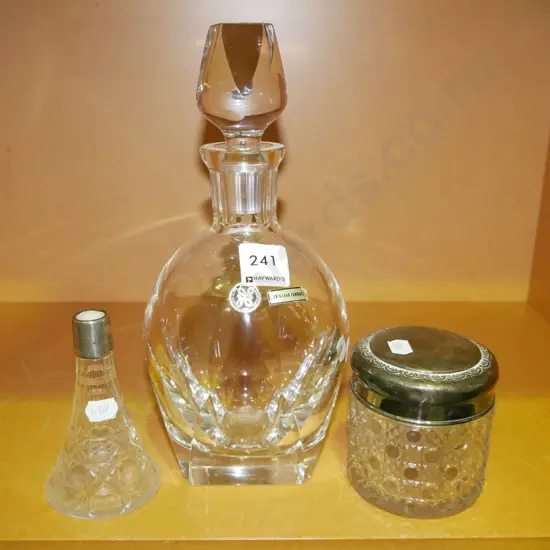 cut crystal decanter, vase, lidded jar