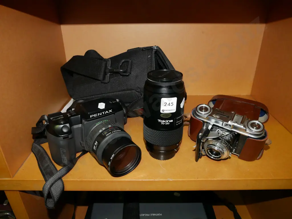 Pentax SF 7 35mm camera with additional Tokina lens and vintage Vito leather cased camera Image 1++