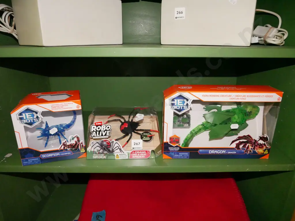 3x boxed toy plastic robots Image 1++