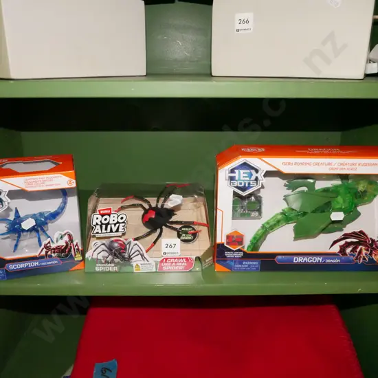 3x boxed toy plastic robots